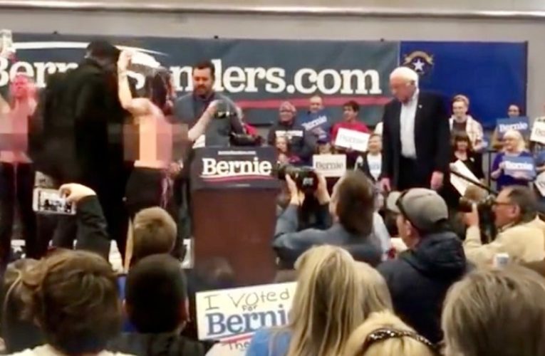 Crazy topless Vegans takes the microphone of Bernie Sanders on sunday