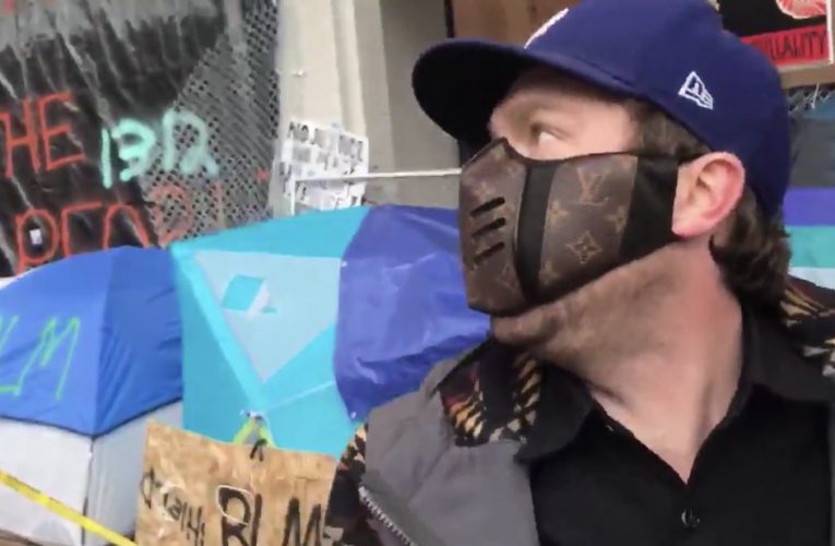 Portland Antifa Militant Who Tries To Seize Journalist Has On $239 Louie Vuitton Mask