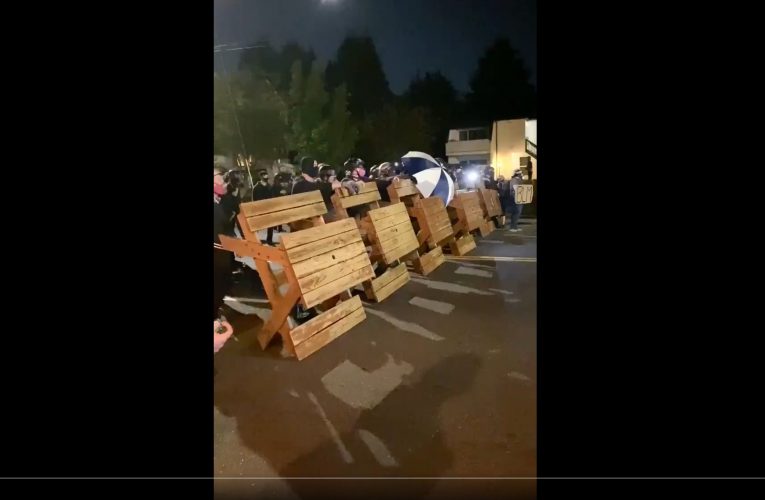 Rioters In Portland steal restaurant benches and Erect Barricade In Street